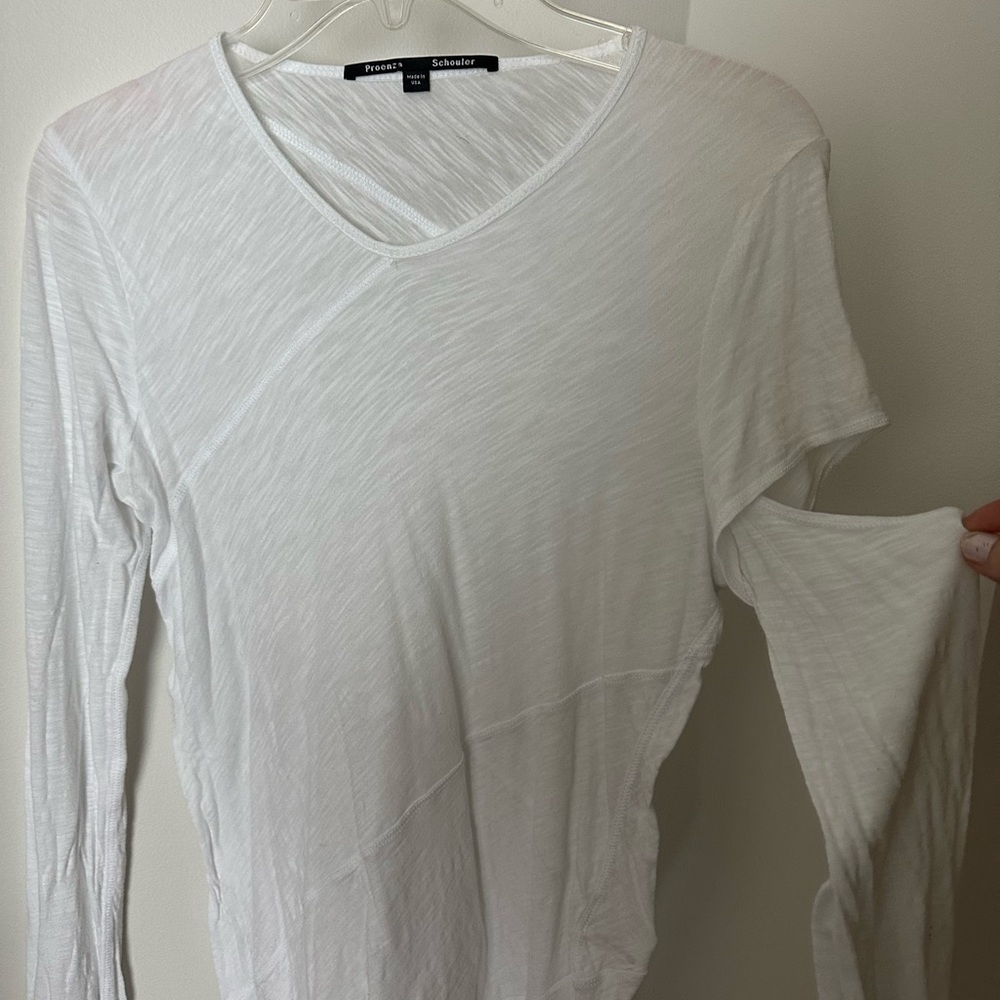 Proenza Schouler thin cotton top, with a cool cutout just below one sleeve!